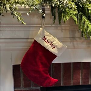 Pottery Barn Red and Cream Holiday Stocking. MARLEY